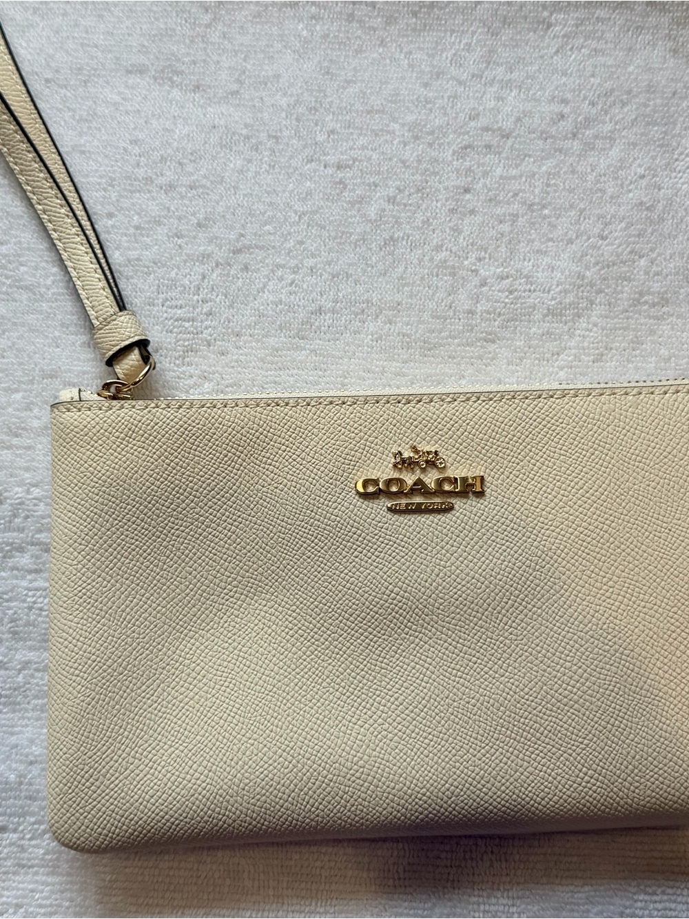COACH Pebbled Leather Wristlet in Ivory with Gold Logo